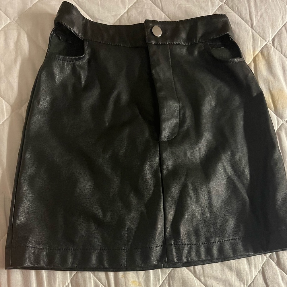 Black leather mini skirt